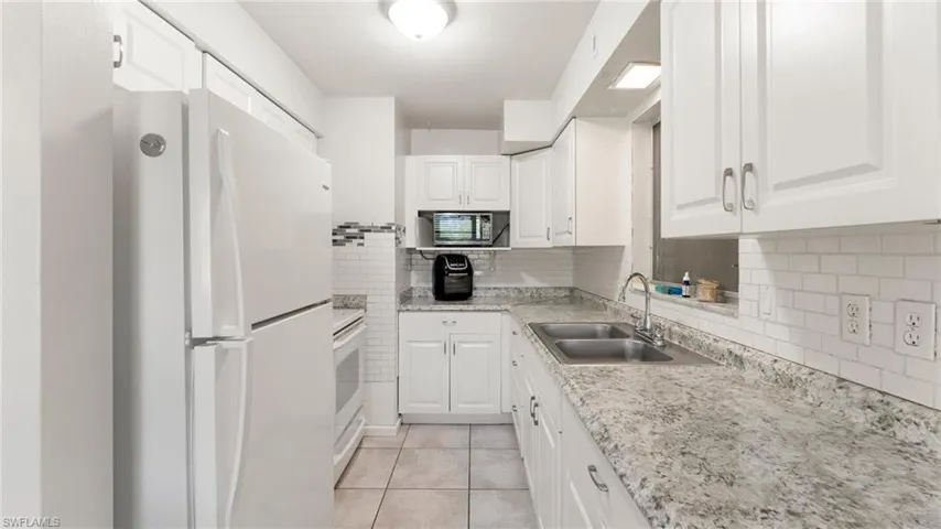 908 E Jasmine  RD, Lehigh Acres, FL 33936