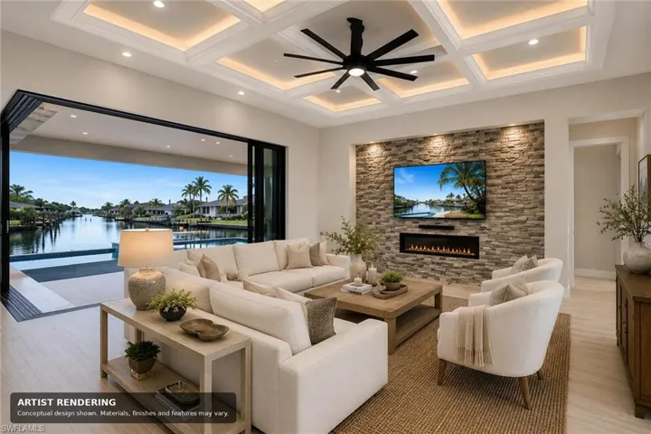 Coffered ceiling with recessed lighting and ceiling fan, stone-finish accent wall with integrated fireplace, large sliding glass doors, and light-toned flooring