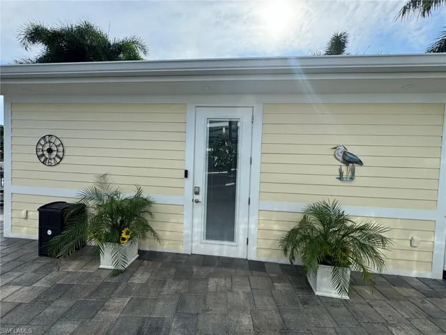 Entrance to property with a patio area