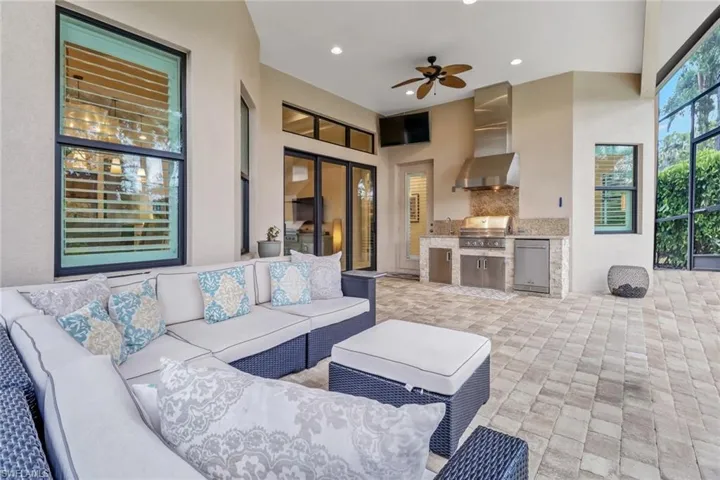 Living room featuring ceiling fan
