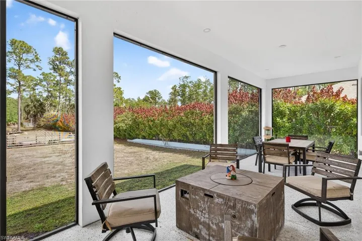 Sunroom with speckle patterned floor
