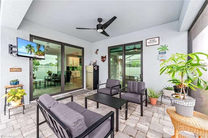 View of patio with ceiling fan