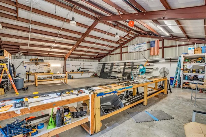 Garage featuring a workshop area
