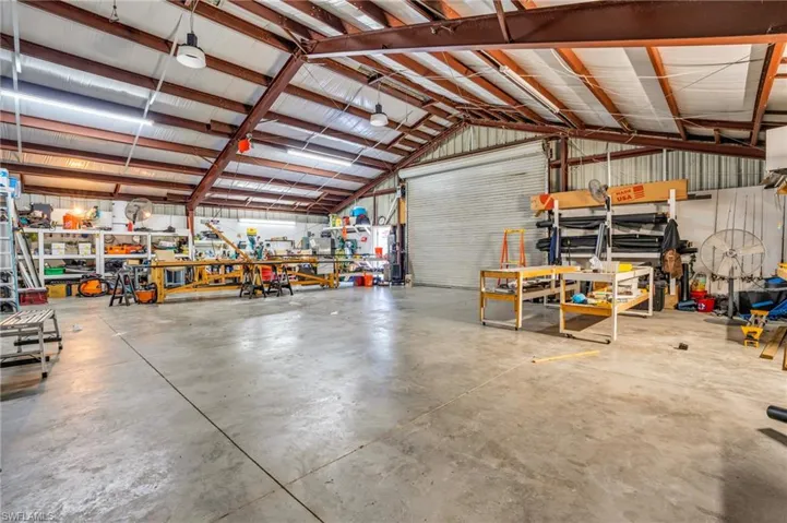 Garage featuring a workshop area