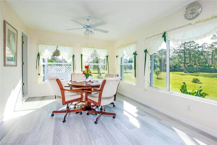 Spacious sun room with beautiful views of the yard