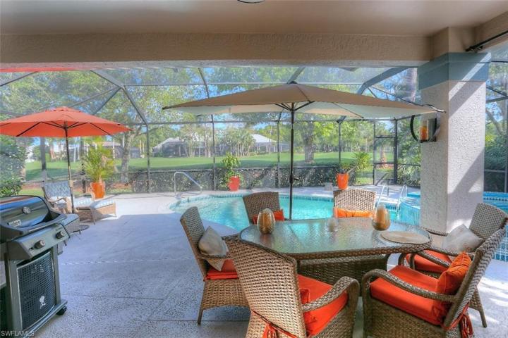 Screened Lanai and Pool area Golf course view
