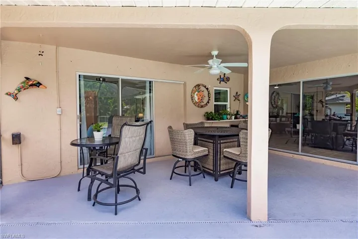 View of terrace featuring ceiling fan