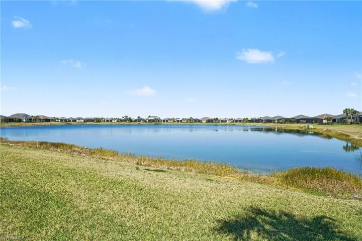 Water view with nearby suburban area