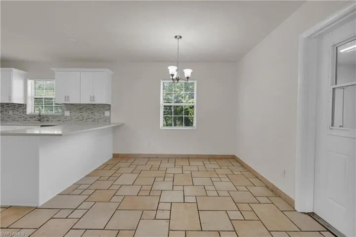 Large Dining Area With New Light!