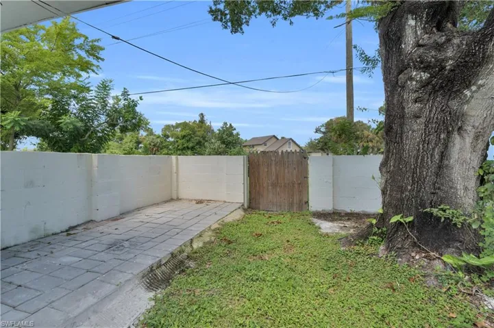 Gate To Back Yard And Pavered Area For Trash Cans!