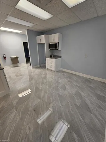 Large Kitchen Area leading to the bathrooms