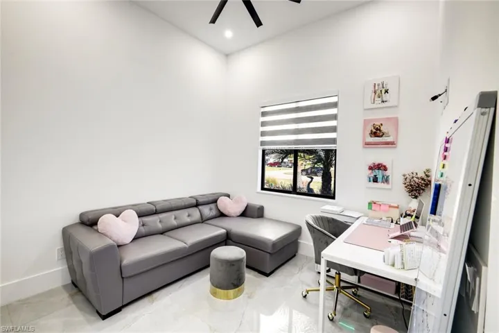 Bedroom with recessed lighting, baseboards, and a ceiling fan.