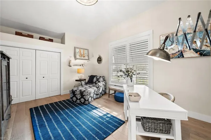 Sitting room featuring light hardwood / wood-style flooring