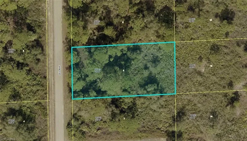 Aerial map of property and surrounding area featuring property parcel outlined