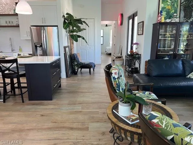 Living area featuring light wood-style floors