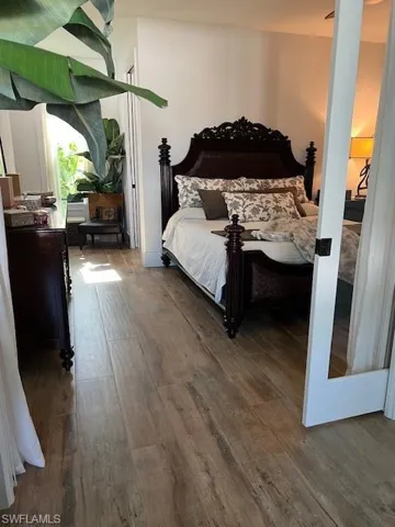 Bedroom featuring dark wood finished floors
