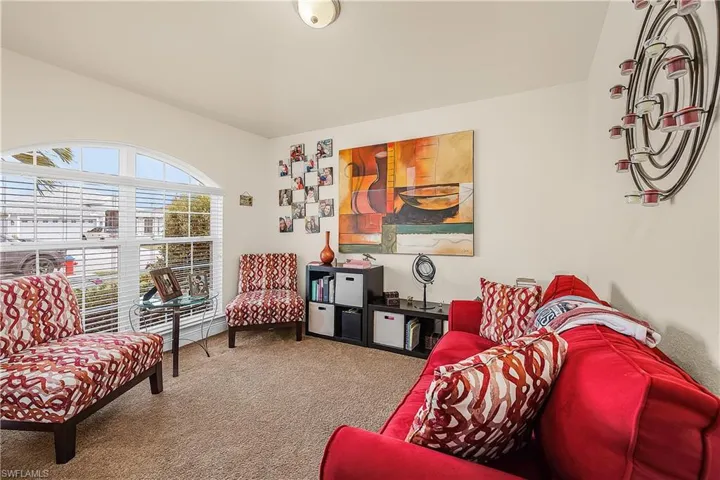 Living area featuring carpet floors