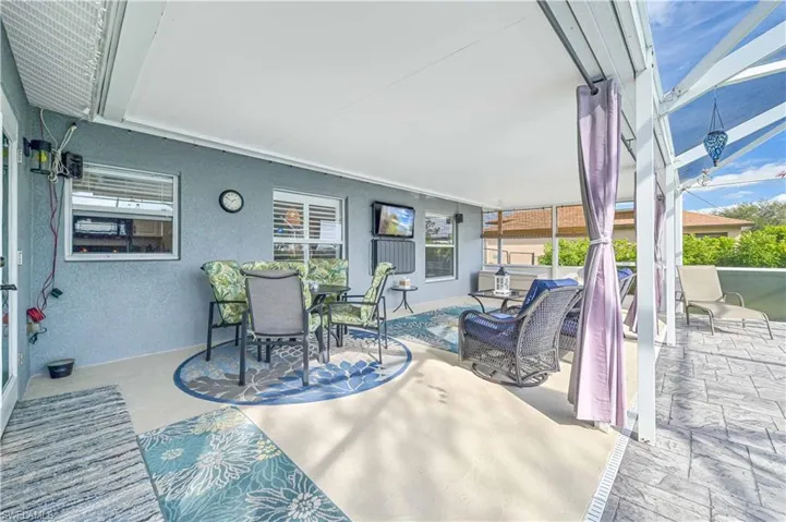 View of patio with outdoor dining space