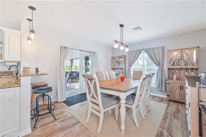 Dining space featuring light wood-style floors