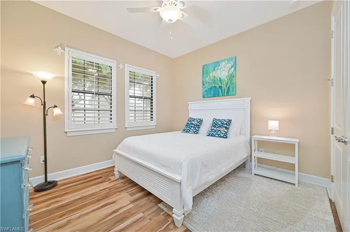 Bedroom featuring light wood finished floors and ceiling fan