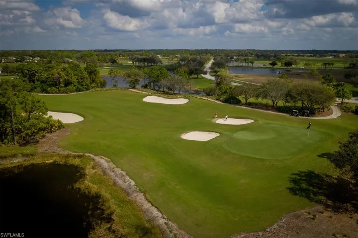Bird's eye view of a large body of water and a golf club