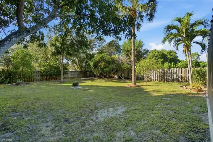 View of fenced backyard