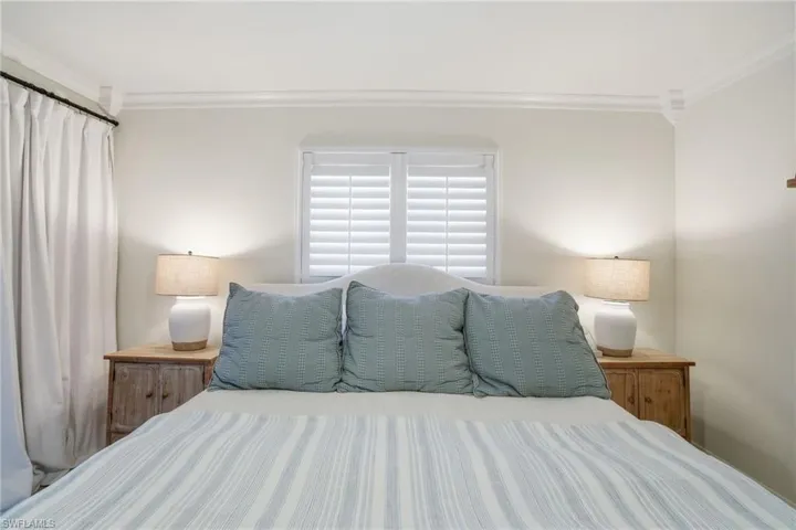 Bedroom with ornamental molding