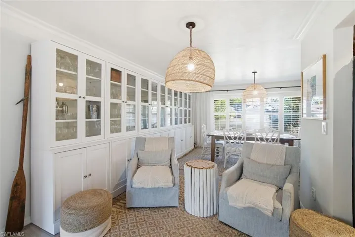Sitting room featuring ornamental molding