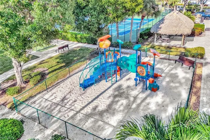 Community play area featuring a patio area and a gazebo