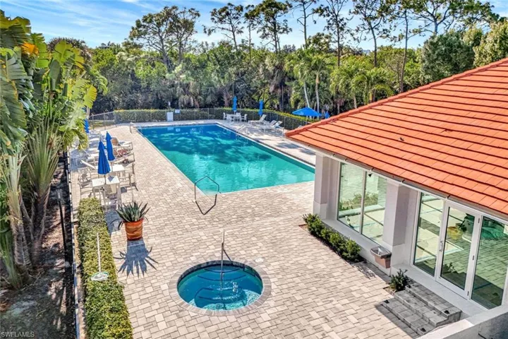 Community pool featuring a patio area