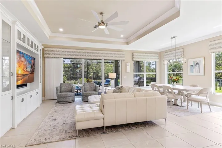 The eight blade ceiling fan keeps the whole great room cool.