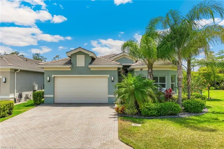 Lovely mature landscaping.  Garage has epoxy flooring, overhead storage rack, and additional storage.