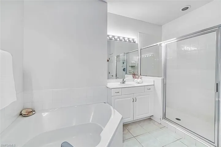 Primary Bathroom - soaking tub. walk-in shower & double vanities