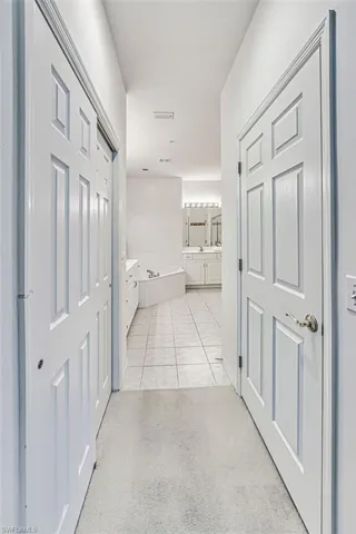 Primary Bedroom closets - Walk in to the right and standard closet to the left