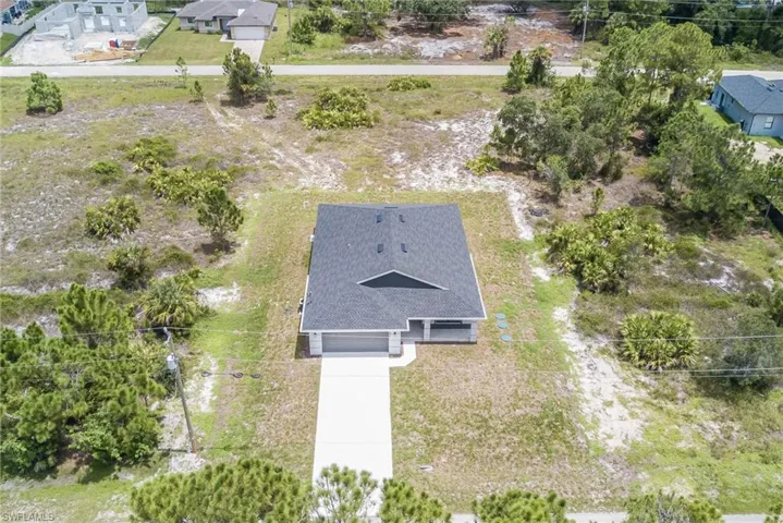 Aerial view of property and surrounding area