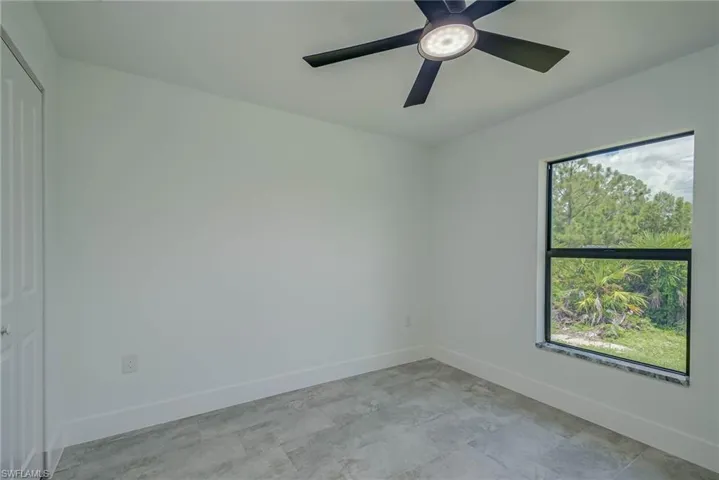 Empty room with baseboards
