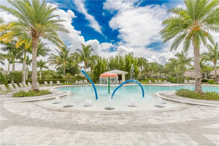 View of swimming pool featuring pool water feature