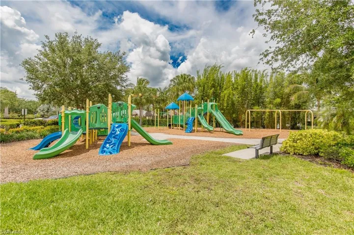 View of playground featuring a yard
