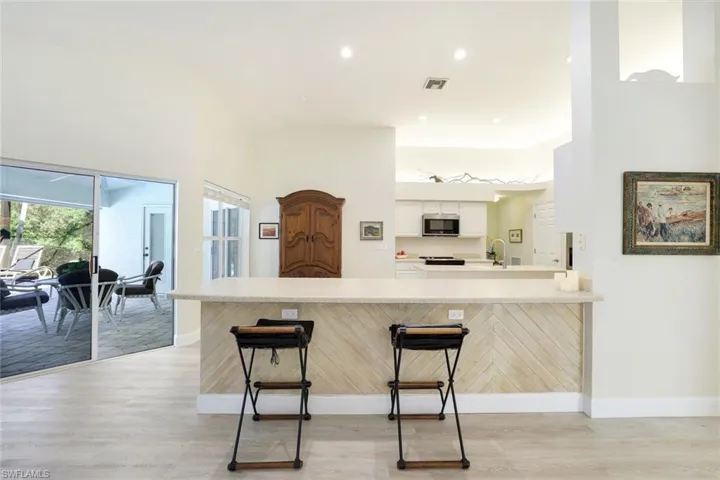 Kitchen and living area open to private lanai.