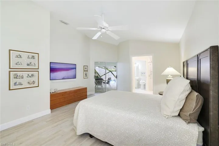 Primary bedroom with sliders to the lanai.