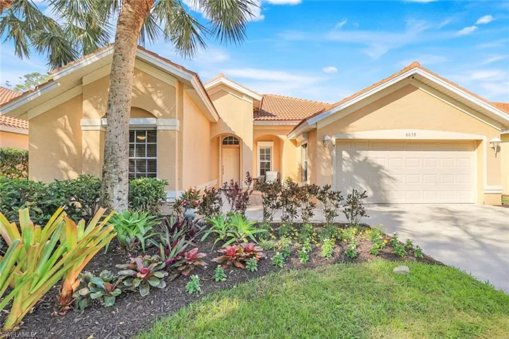 Single-family home on a quiet street, backed up to a preserve.
