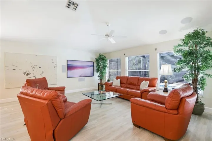 Large flat screen TV with surround sound.