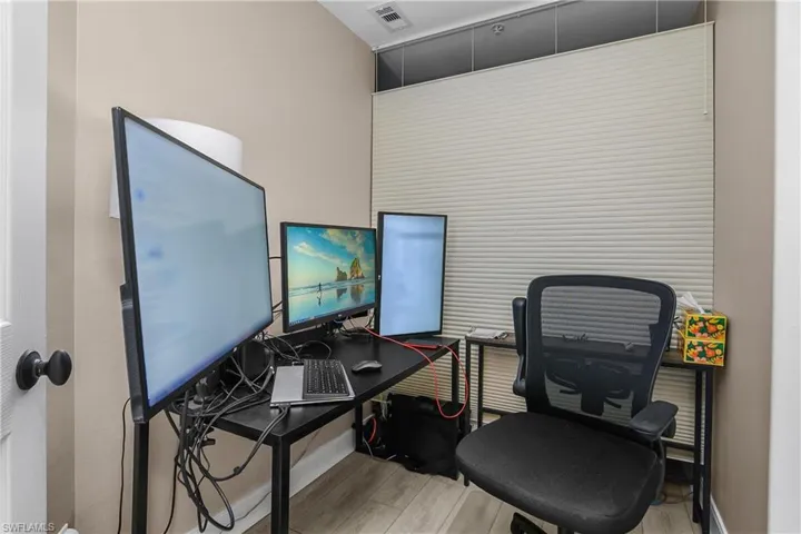 Office featuring light wood finished floors and baseboards