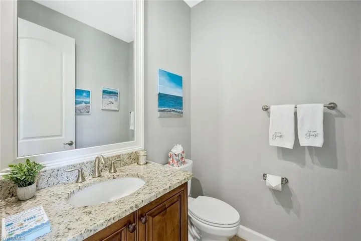 Bathroom featuring toilet and vanity