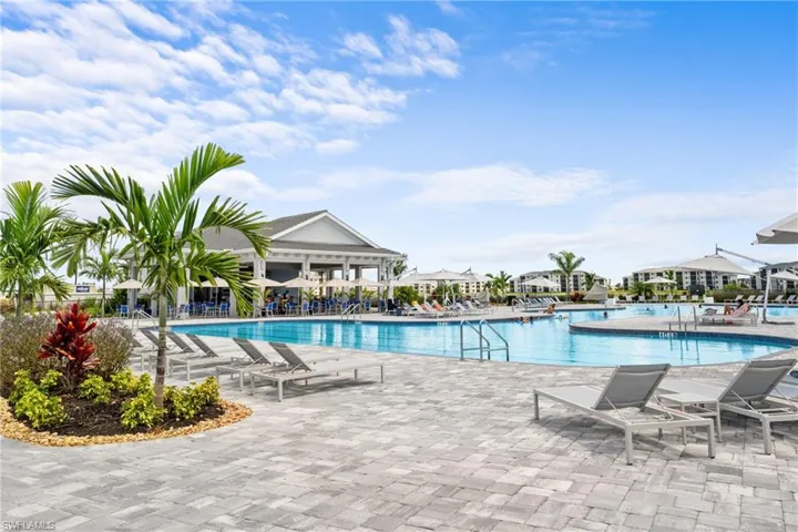 Community pool featuring a patio area