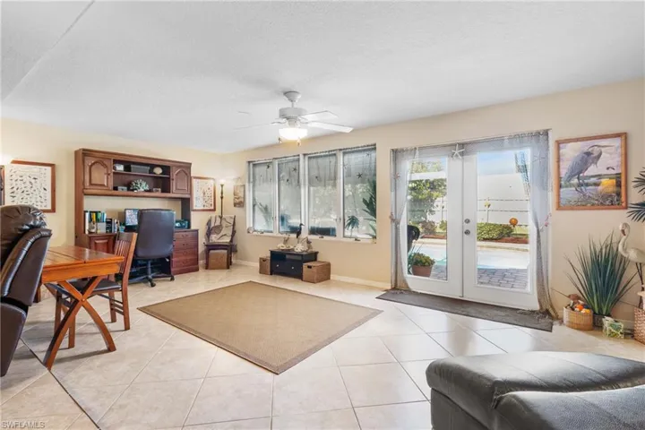 Extra room with French doors to lanai and screened pool area