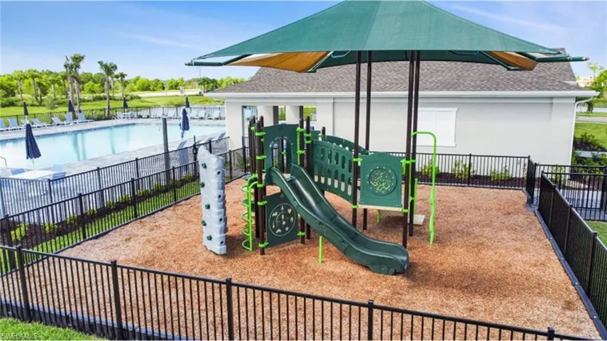 Community playground featuring a community pool