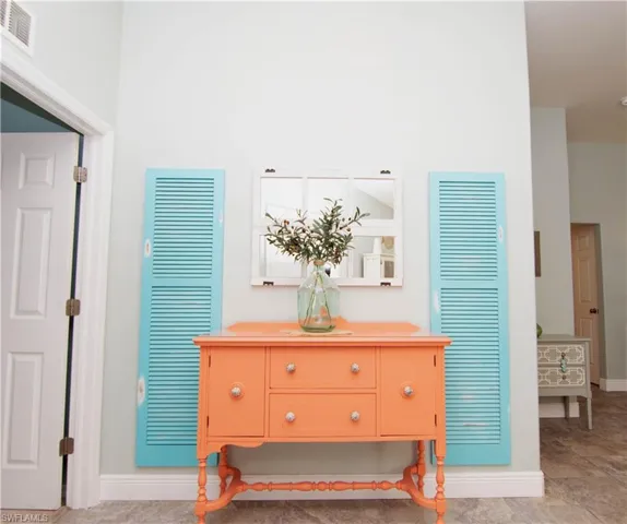 Entry foyer features a colorful display.