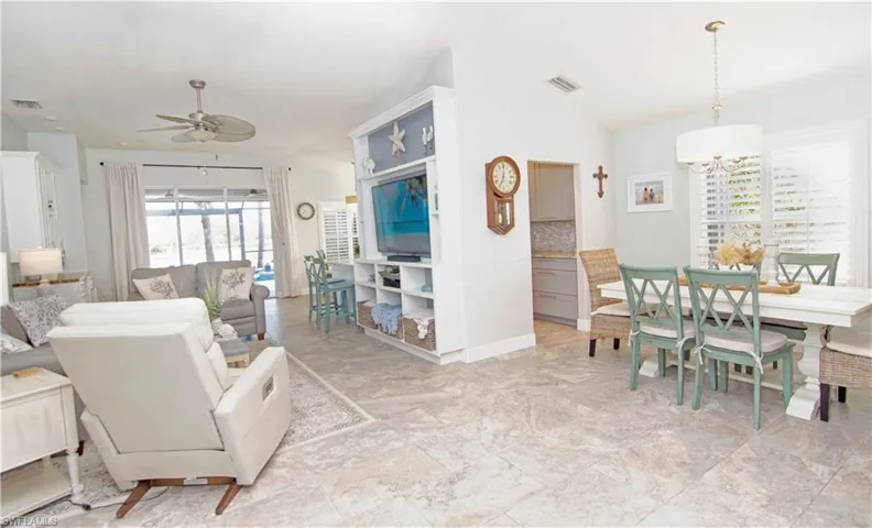 The Dining Room adjacent to the Living Room has room for 6-8 people to dine.