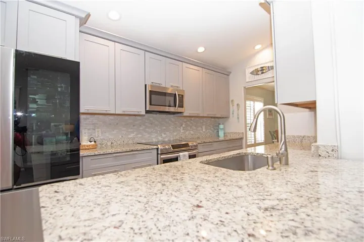 Close up view of the gleaming granite countertops.